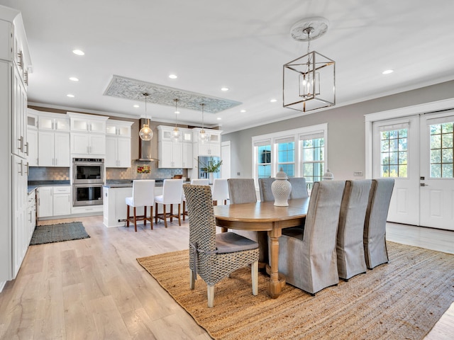61 Sweet Breeze Dr, Santa Rosa Beach, FL 32459 - dining area with ornamental molding, light wood finished floors, a chandelier, and recessed lighting