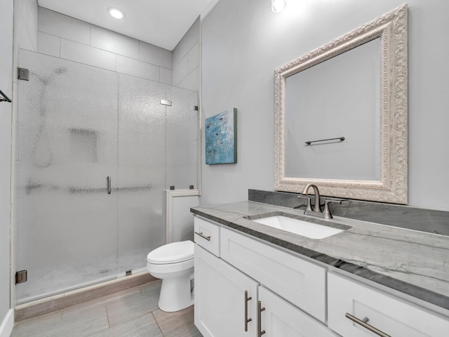 61 Sweet Breeze Dr, Santa Rosa Beach, FL 32459 - bathroom featuring toilet, a stall shower, vanity, and recessed lighting