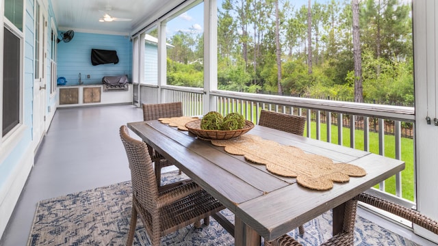61 Sweet Breeze Dr, Santa Rosa Beach, FL 32459 - sunroom with outdoor dining area
