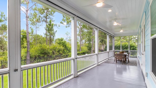 61 Sweet Breeze Dr, Santa Rosa Beach, FL 32459 - sunroom featuring ceiling fan and outdoor dining space