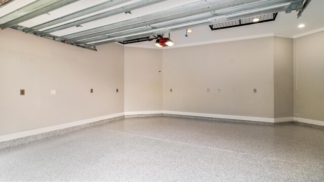 61 Sweet Breeze Dr, Santa Rosa Beach, FL 32459 - garage with a garage door opener and baseboards