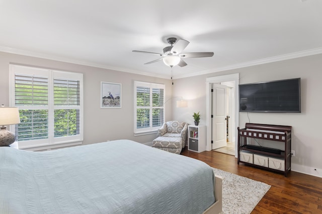 bedroom featuring ceiling fan, ornamental molding, and dark hardwood / wood-style floors