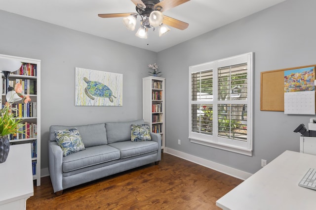 interior space with ceiling fan and dark hardwood / wood-style flooring