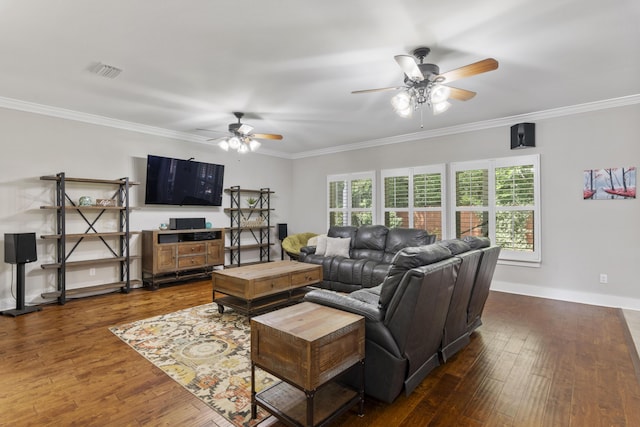 living room with ornamental molding, dark hardwood / wood-style floors, and ceiling fan