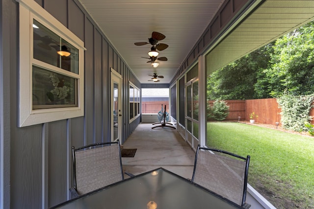 view of patio featuring ceiling fan