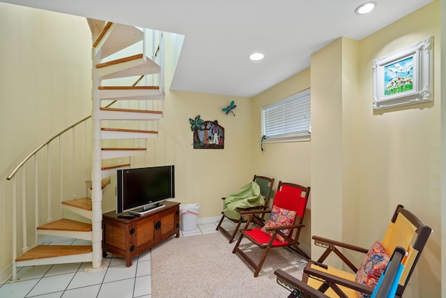 sitting room featuring light tile patterned floors