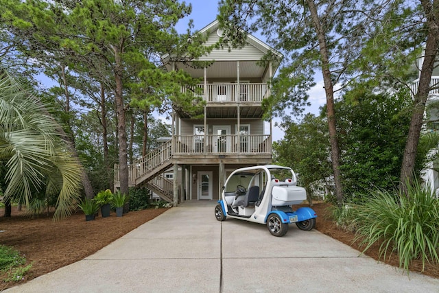 coastal home featuring a porch