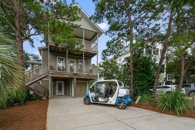 view of front of home with a balcony