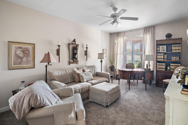 carpeted living room with ceiling fan