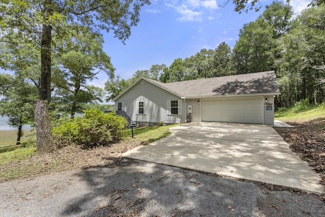 single story home with a garage