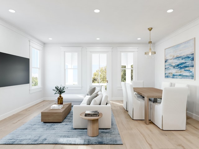 interior space with light hardwood / wood-style floors, ornamental molding, and plenty of natural light