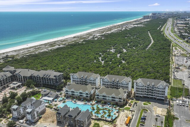 aerial view featuring a view of the beach and a water view