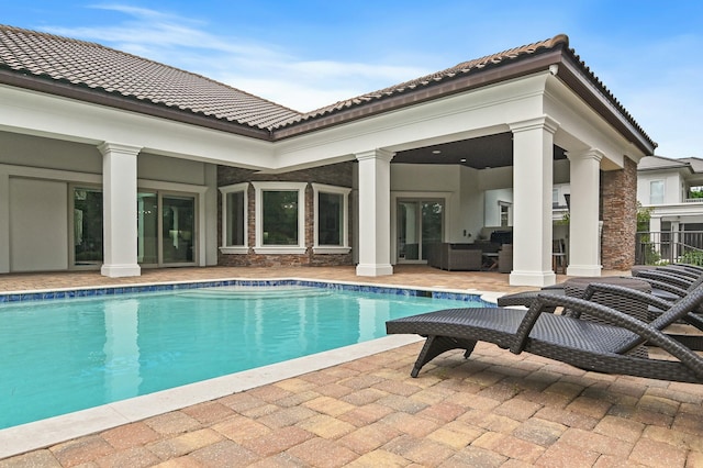 outdoor pool with a patio