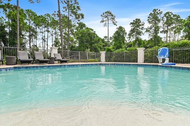 view of pool featuring fence and a fenced in pool