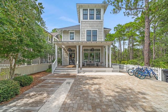 back of house with a porch