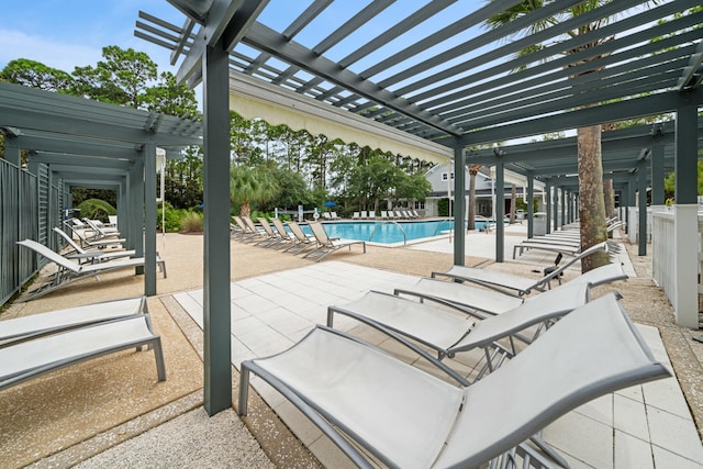 view of patio featuring a pergola and a community pool