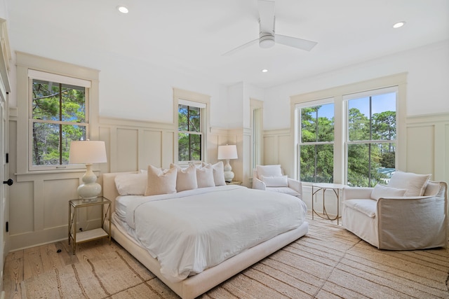 bedroom featuring light wood-type flooring and ceiling fan