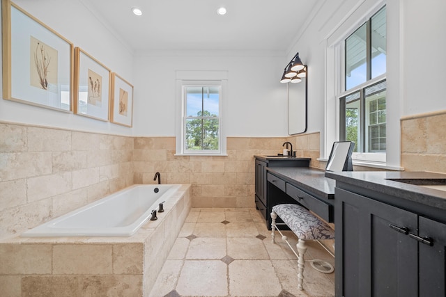 bathroom with vanity, tiled bath, tile patterned flooring, and ornamental molding