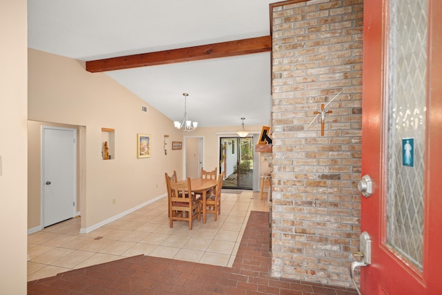 dining area featuring vaulted ceiling with beams, brick wall, and a chandelier