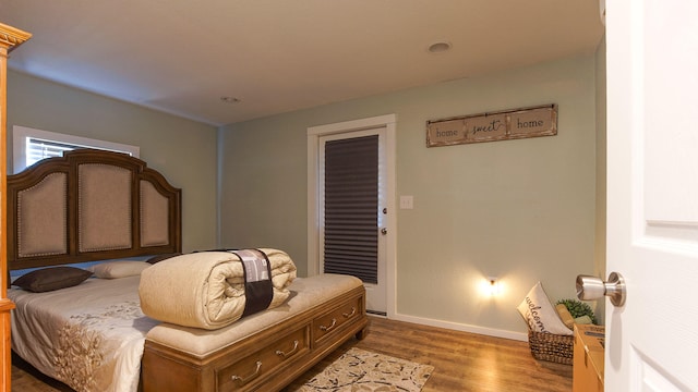 bedroom featuring hardwood / wood-style flooring