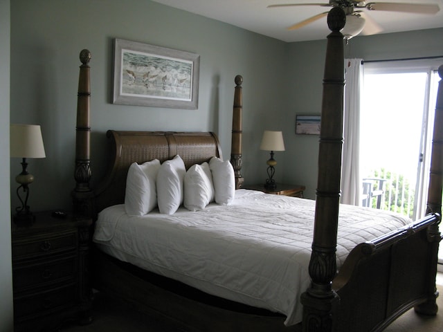 bedroom featuring ceiling fan and multiple windows