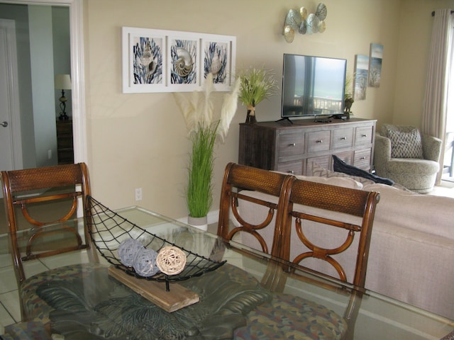 living area featuring tile patterned flooring