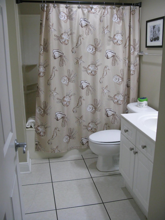 full bathroom featuring tile patterned flooring, vanity, shower / bath combo, and toilet