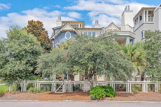 view of community featuring a fenced front yard