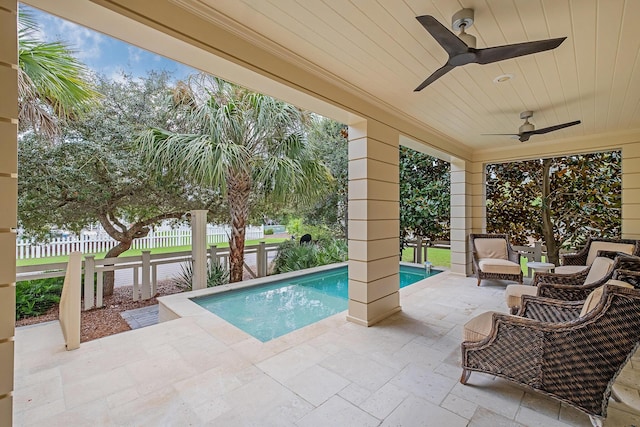 view of pool with a patio, fence, and a fenced in pool