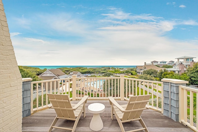 wooden deck with a water view