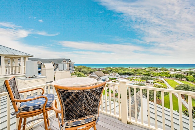 wooden deck featuring a water view