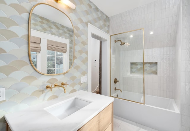 full bathroom with tile patterned flooring, wallpapered walls, vanity, and  shower combination