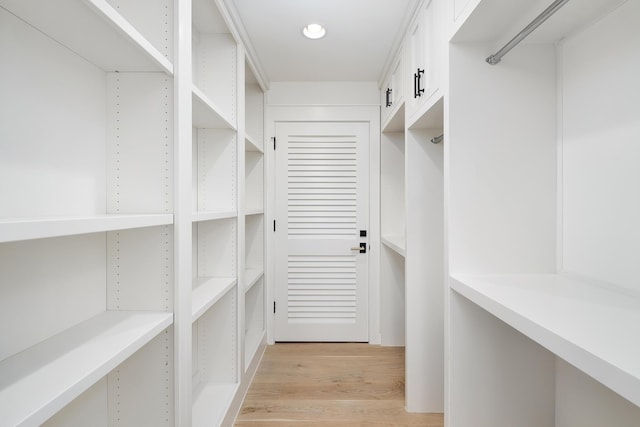 spacious closet with light wood-style floors