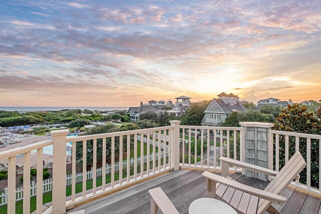 wooden deck featuring a water view