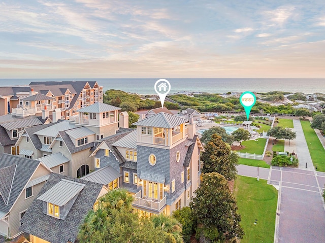 bird's eye view with a water view and a residential view