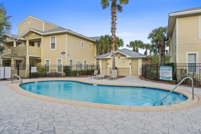 view of pool featuring a patio area