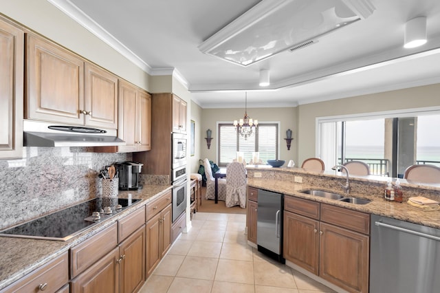 kitchen featuring sink, light tile patterned floors, a notable chandelier, stainless steel appliances, and light stone countertops