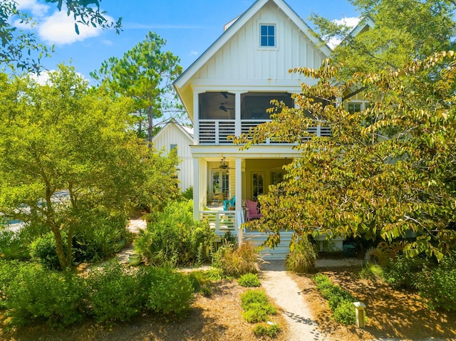 view of front of house with a porch and a balcony