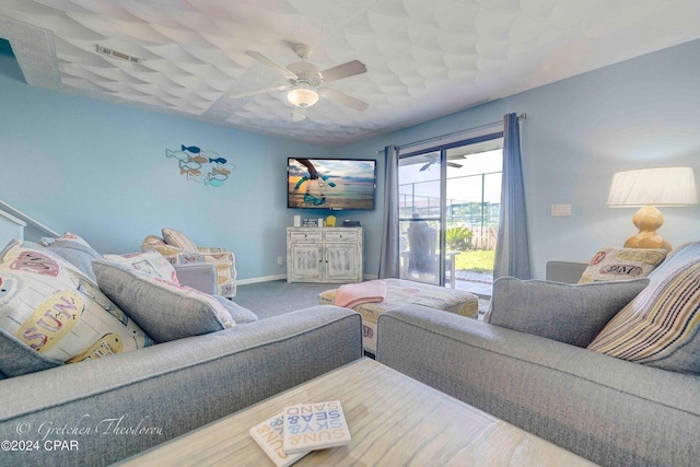 living room featuring ceiling fan