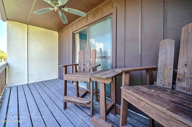 wooden deck with ceiling fan