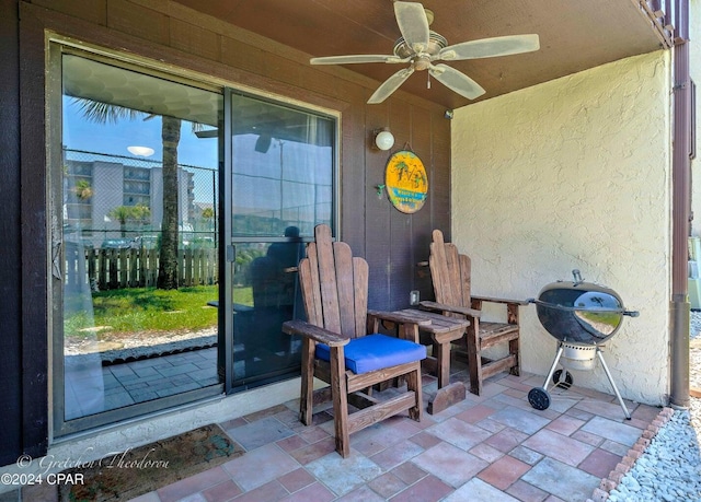 view of patio / terrace featuring grilling area and ceiling fan