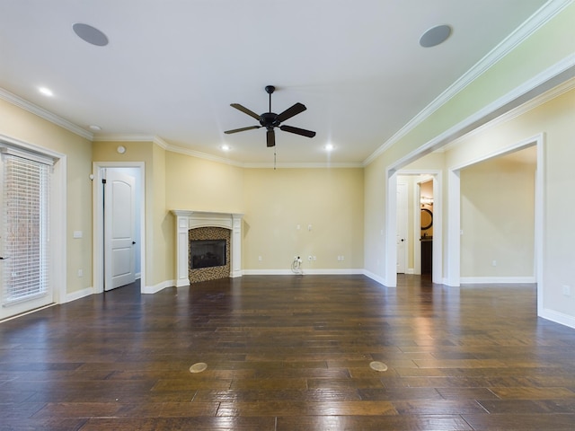 unfurnished living room featuring ceiling fan, crown molding, and wood-type flooring