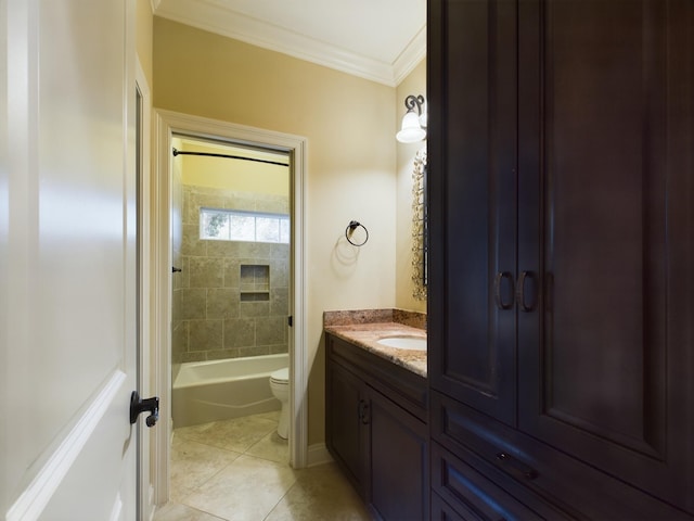 full bathroom with toilet, tile patterned floors, tiled shower / bath combo, ornamental molding, and vanity