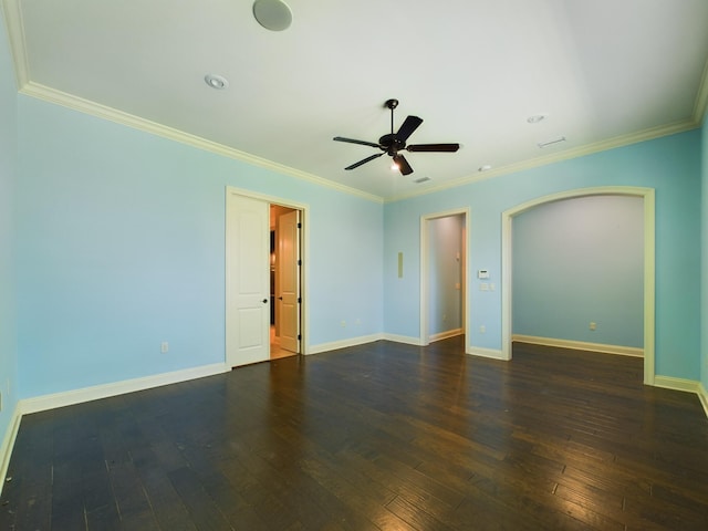 spare room with ceiling fan, wood-type flooring, and crown molding