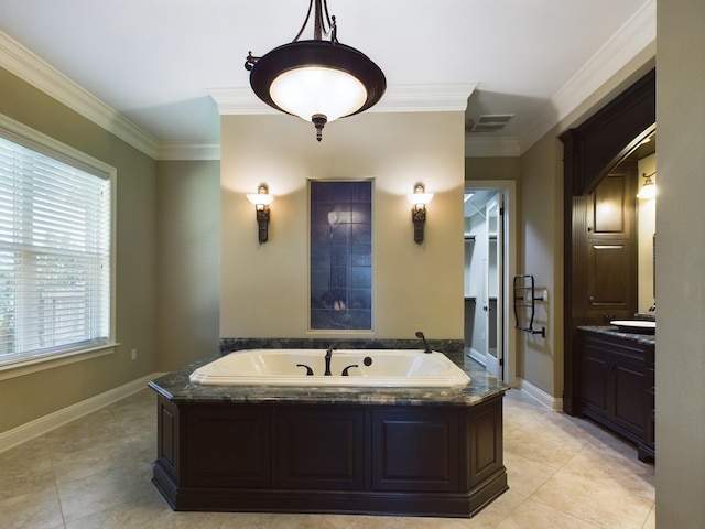 bathroom with crown molding, a bathing tub, and tile patterned flooring