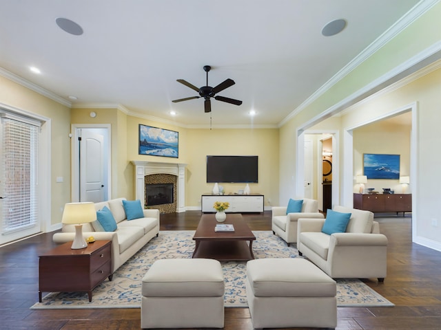 living room featuring ceiling fan, crown molding, dark hardwood / wood-style flooring, and plenty of natural light