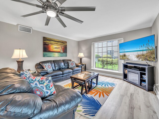 452 N Driftwood Bay Unit 96B, Miramar Beach, FL 32550 - living area with visible vents, wood finished floors, ornamental molding, and a ceiling fan