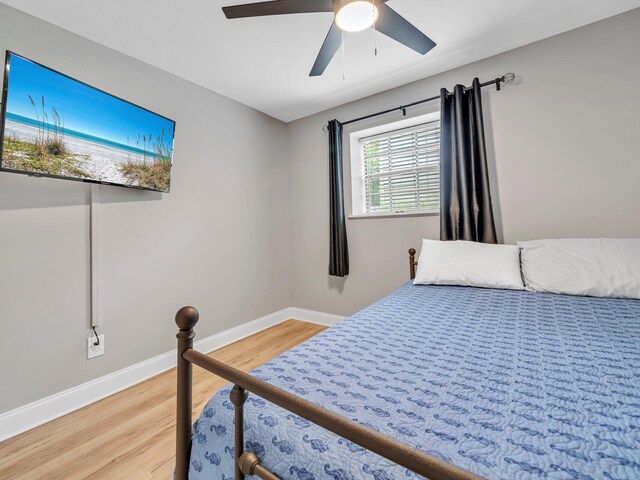 452 N Driftwood Bay Unit 96B, Miramar Beach, FL 32550 - bedroom with light wood finished floors, baseboards, and a ceiling fan