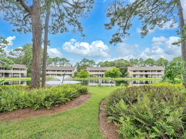 view of yard featuring a water view