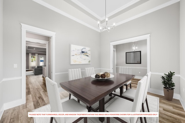 dining area featuring an inviting chandelier, light hardwood / wood-style flooring, and ornamental molding